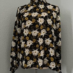 Mock Neck long sleeve blouse.